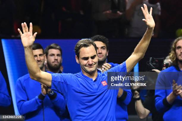 Switzerland's Roger Federer reacts after playing his final game a doubles with Spain's Rafael Nadal of Team Europe in the 2022 Laver Cup at the O2...