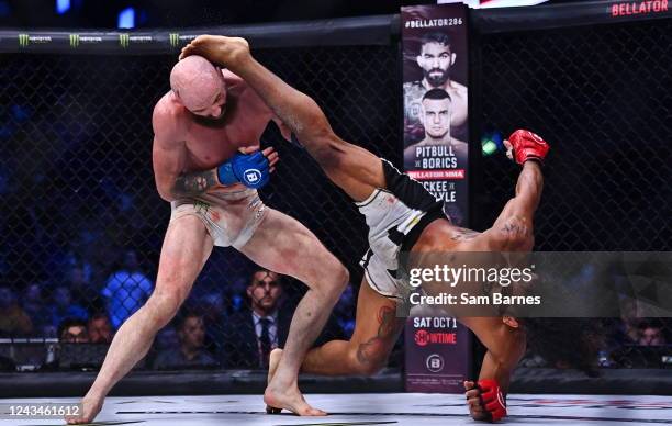 Dublin , Ireland - 23 September 2022; Benson Henderson, right, in action against Peter Queally during their lightweight bout during Bellator 285 at 3...