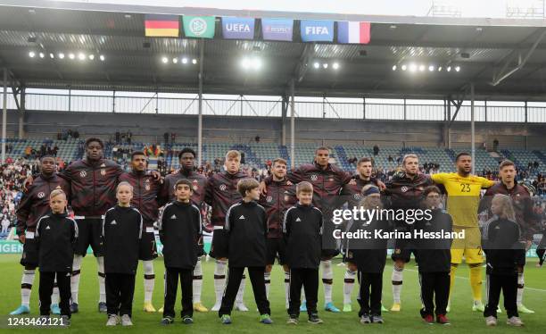 Team of Germany during the national hymn during the International Friendly between Germany U21 and France U21 at MDCC Arena on September 23, 2022 in...