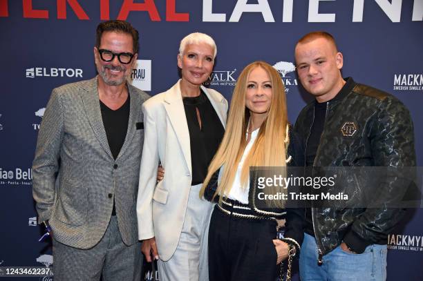 Alex Jolig, his wife Britt Jolig-Heinz, Jenny Elvers and her son Paul Elvers attend the Late Night Shopping Party at Alstertal-Einkaufszentrum on...