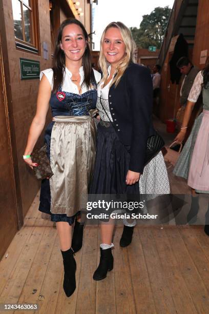 Alexandra Kinshofer and her sister Stephanie Kinshofer during the 187th Oktoberfest at Kaefer-Schaenke /Theresienwiese on September 23, 2022 in...