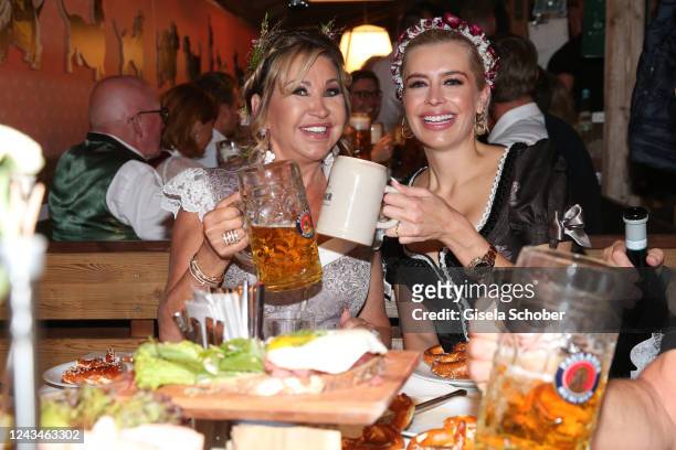 Carmen Geiss and Verena Kerth during the 187th Oktoberfest at Kaefer-Schaenke /Theresienwiese on September 23, 2022 in Munich, Germany.
