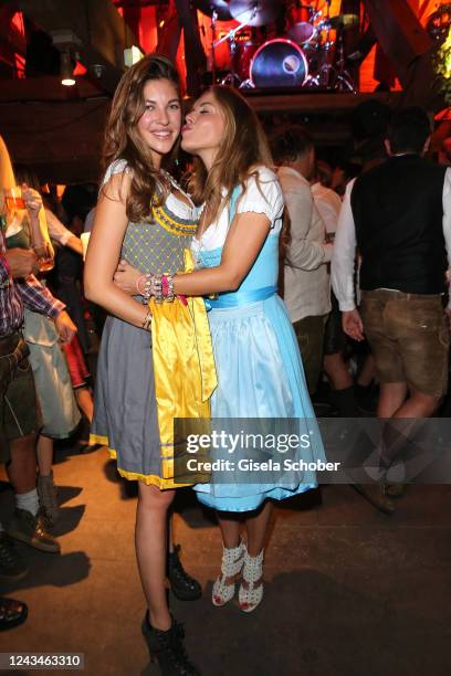 Paulina Swarovski and Victoria Swarovski during the 187th Oktoberfest at Kaefer-Schaenke /Theresienwiese on September 23, 2022 in Munich, Germany.