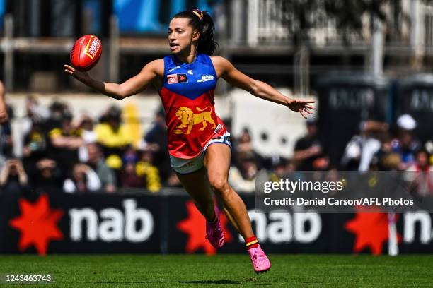 Jade Ellenger of the Lions gathers the ball during the 2022 S7 AFLW Round 05 match between the Richmond Tigers and the Brisbane Lions at Swinburne...