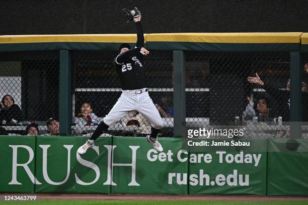 Andrew Vaughn of the Chicago White Sox makes a leaping catch at the right field wall of a hit off the bat of Javier Báez of the Detroit Tigers in the...