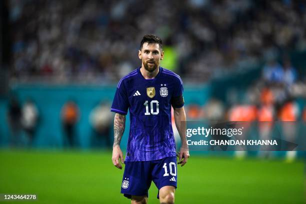 Argentina's Lionel Messi walks on the pitch during the international friendly match between Honduras and Argentina at Hard Rock Stadium in Miami...