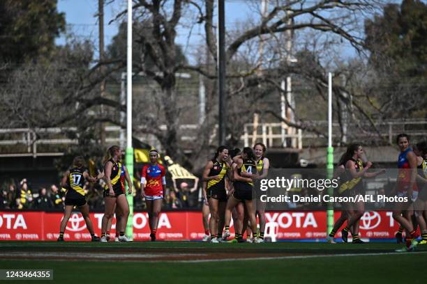 The Tigers celebrate the win during the 2022 S7 AFLW Round 05 match between the Richmond Tigers and the Brisbane Lions at Swinburne Centre on...