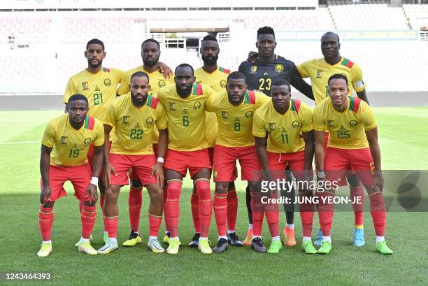 This picture taken on September 23, 2022 shows Cameroon's players posing for a team photo prior to a friendly football match between Uzbekistan and...