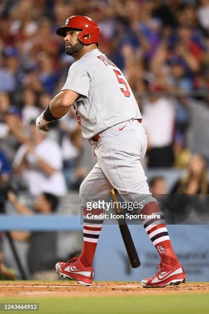 St. Louis Cardinals designated hitter Albert Pujols watches his career home run number 700 as a three run home run in the 4th inning of the MLB game...