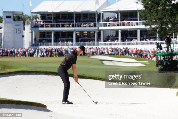 Presidents Cup golfer Cam Davis hits out of a fairway bunker on the 15th hole during the second round of the Presidents Cup on September 23, 20 at...