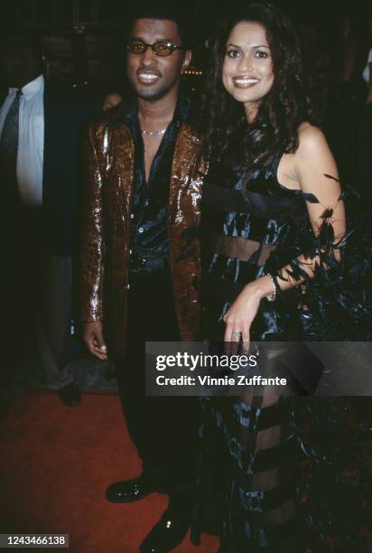 American singer-songwriter Babyface and his wife, American television producer Tracey Edmonds attend the premiere of 'Soul Food', held at the Mann...