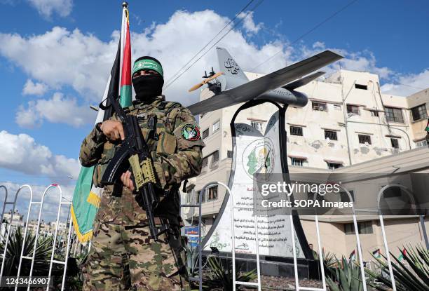 Member of the Izz al-Din al-Qassam Brigades, the military wing of the Islamic Movement of Hamas, participates during the inauguration of the "Shehab...