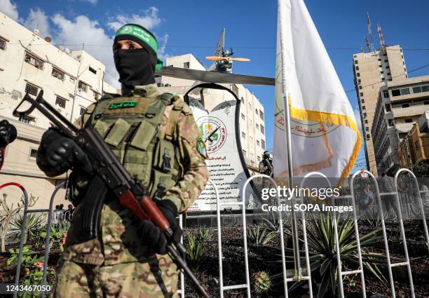 Member of the Izz al-Din al-Qassam Brigades, the military wing of the Islamic Movement of Hamas, participates during the inauguration of the "Shehab...