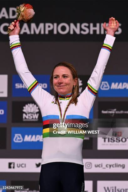 Annemiek Van Vleuten of Netherlands celebrates on the podium after winning the women's road race cycling event at the UCI 2022 Road World...