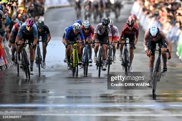 Dutch Annemiek Van Vleuten crosses the finish line of the women's elite road race at the UCI Road World Championships Cycling 2022, in Wollongong,...