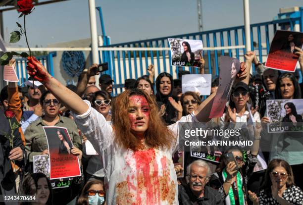 Woman acts out and performs in a mock play depicting the death of 22-year-old Mahsa Amini while in the custody of Iranian authorities, during a...