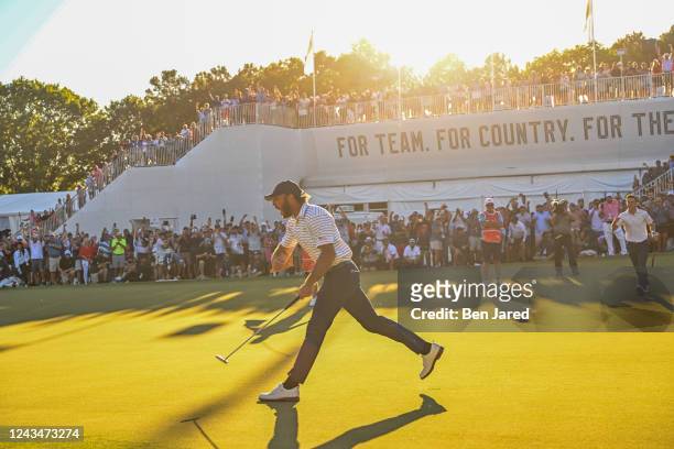 United States Team Member Max Homa reacts after making a putt on the 18th hole during the second round Four-Ball matches of Presidents Cup at Quail...