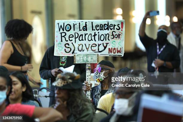 Los Angeles, CaliforniaSept. 22, 2022Los Angeles long-time resident, Walter Foster, age 80, holds up a sign as the Reparations Task Force meets to...