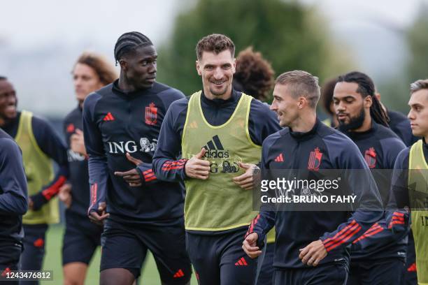 Belgium's Amadou Onana, Belgium's Thomas Meunier and Belgium's Timothy Castagne pictured during a training session of the Belgian national soccer...