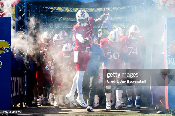 Jalon Daniels of the Kansas Jayhawks leads the team onto the field before a game against the Duke Blue Devils at David Booth Kansas Memorial Stadium...