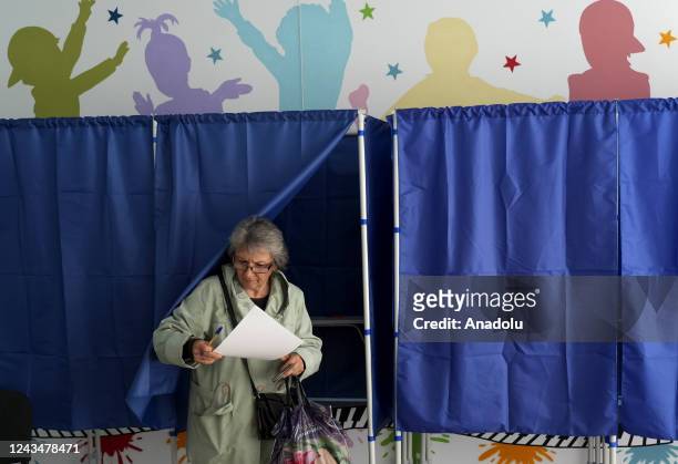 People cast their votes in controversial referendums at a hospital in Donetsk Oblast, Ukraine on September 24, 2022. Voting will run from Friday to...