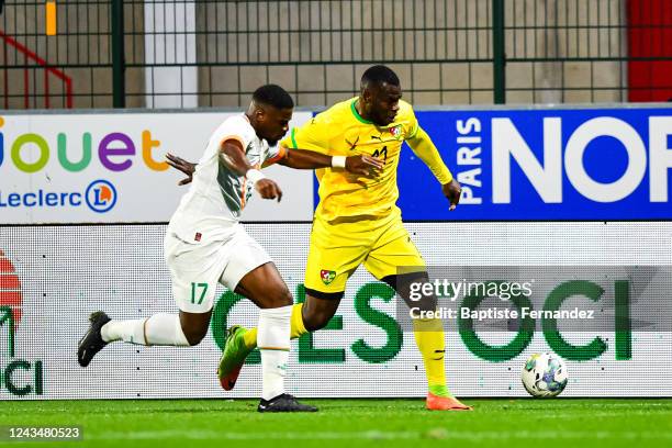 Serge AURIER of Ivory Coast and Ismail OURO AGORO of Togo during the International friendly match between Ivory Coast and Togo on September 24, 2022...