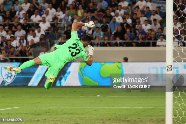 Albania's goalkeeper Thomas Strakosha saves a shot during the UEFA Nations League - League B Group 2 - football match between Israel and Albania at...