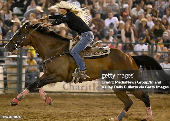 Michelle Reiser Racer Barrel racer Michelle Alley, from Madisonville, Texas, races back ...