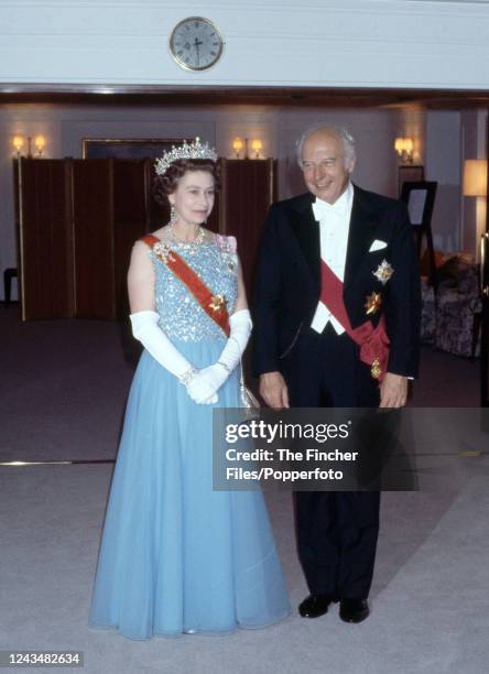 Queen Elizabeth II alongside German President Walter Scheel on board the Royal Yacht Britannia for a banquet hosted by the Queen during her official...