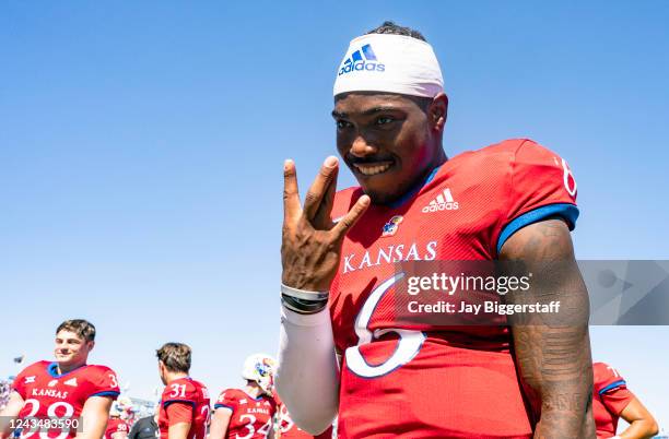 Jalon Daniels of the Kansas Jayhawks celebrates after defeating the Duke Blue Devils 35-27 at David Booth Kansas Memorial Stadium on September 24,...