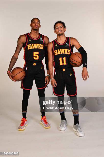 Dejounte Murray and Trae Young of the Atlanta Hawks pose for a portrait during NBA Media Day on September 23, 2022 at PC&E Studio in Atlanta,...