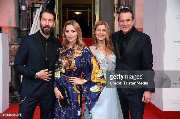 Alec Voelkel of the band The BossHoss, his wife Johanna Michels, Sascha Vollmer of the band The BossHoss and his wife Jenny Kurr attend the 27th...