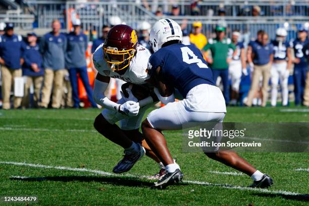 Penn State Nittany Lions Cornerback Kalen King tackles Central Michigan Chippewas Wide Receiver Caroles Carriere during the second half of the...