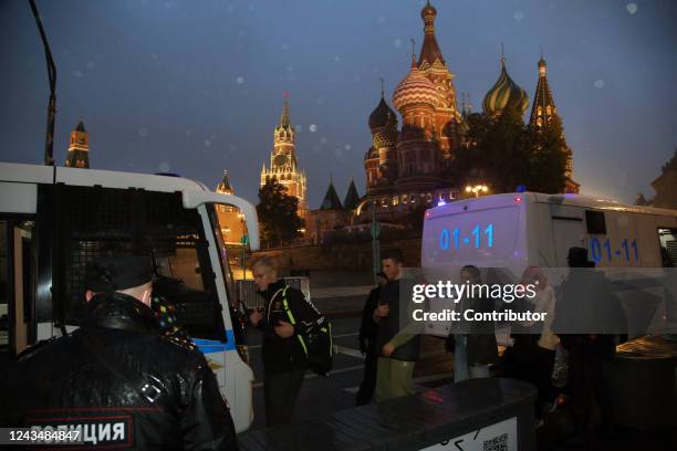 Police officers detain protesters during an unsanctioned rally hosted by the Vesna Movement in protest against the military invasion on Ukraine and...