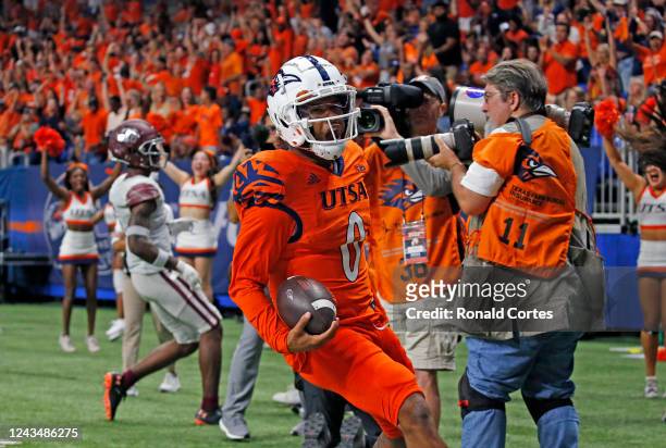 Quarterback Frank Harris of the UTSA Roadrunners celebrates a touchdown against Texas Southern Tigers at the Alamodome on September 24, 2022 in San...
