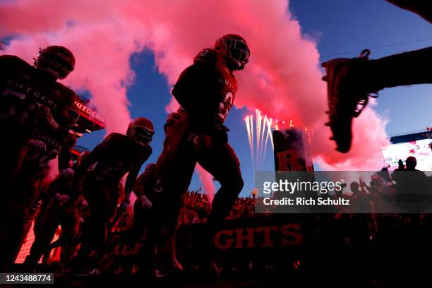 The Rutgers Scarlet Knights run onto the field before their game against the Iowa Hawkeyes at SHI Stadium on September 24, 2022 in Piscataway, New...