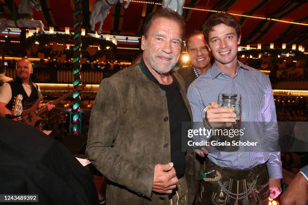 Arnold Schwarzenegger, Daniel Marshall and Patrick Schwarzenegger during the 187th Oktoberfest at Marstall tent /Theresienwiese on September 24, 2022...