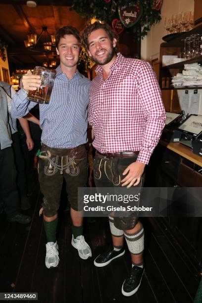 Patrick Schwarzenegger and his brother Christopher Schwarzenegger during the 187th Oktoberfest at Marstall tent /Theresienwiese on September 24, 2022...
