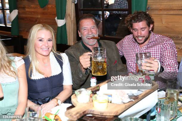 Heather Milligan, Arnold Schwarzenegger and his son Christopher Schwrazenegger during the 187th Oktoberfest at Marstall tent /Theresienwiese on...