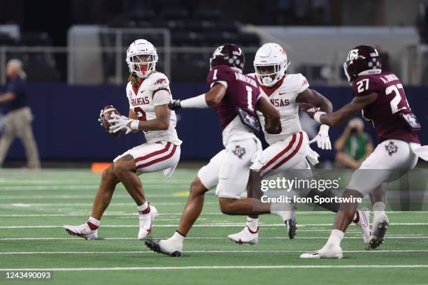 Arkansas Razorbacks wide receiver Jadon Haselwood attempts to pass on a flea flicker play during the Southwest Classic game between Arkansas and...