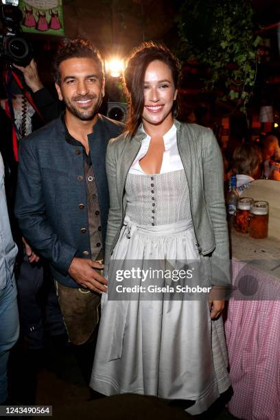 Elyas M'Barek and his wife Jessica M'Barek during the 187th Oktoberfest at Kaefer-Schaenke /Theresienwiese on September 24, 2022 in Munich, Germany.