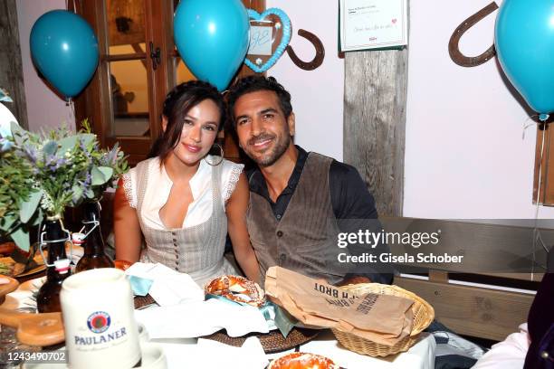 Elyas M'Barek and his wife Jessica M'Barek during the 187th Oktoberfest at Kaefer-Schaenke /Theresienwiese on September 24, 2022 in Munich, Germany.