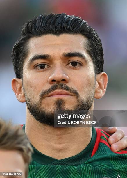 Mexico's forward Henry Martin listens to the national anthem at the soccer friendly between Mexico and Peru, September 24, 2022 at the Rose Bowl in...