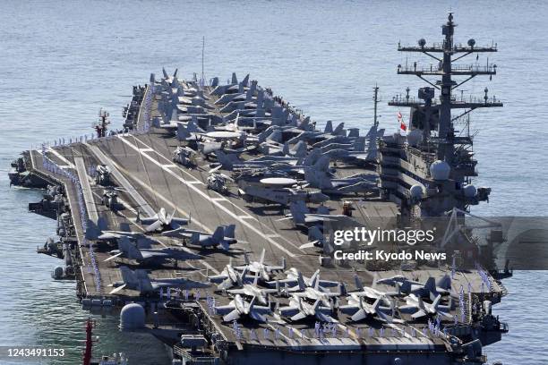 Aircraft carrier Ronald Reagan arrives in Busan on Sept. 23 for the first port call to the South Korean city in nearly five years to join naval...