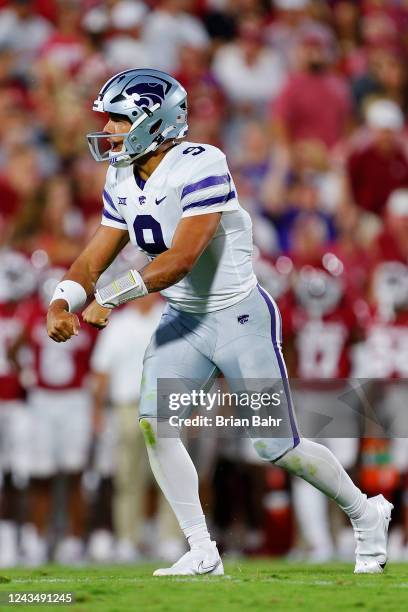 Quarterback Adrian Martinez of the Kansas State Wildcats celebrates a touchdown against the Oklahoma Sooners in the first quarter at Gaylord Family...