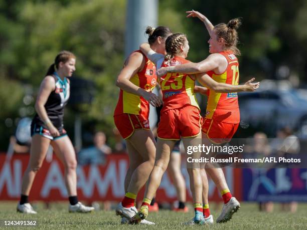 Jacqui Dupuy of the Suns celebrates a goal during the 2022 S7 AFLW Round 05 match between the Gold Coast Suns and the Port Adelaide Power at Bond...