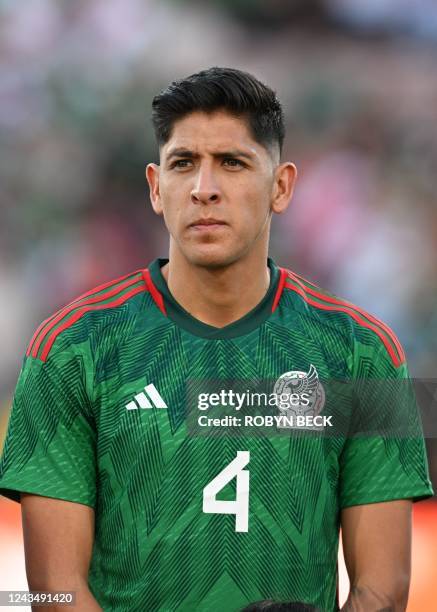 Mexico's midfielder Edson Alvarez listens to the national anthem at the soccer friendly between Mexico and Peru, September 24, 2022 at the Rose Bowl...