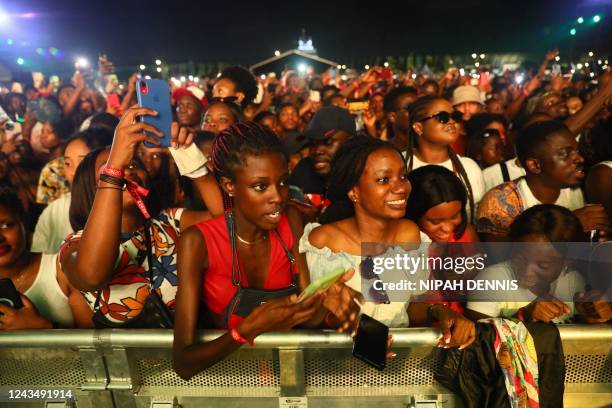 Fans react at the Global Citizen Festival in Accra, on September 24, 2022 during Ghana's first-ever Global Citizen Festival marking the 65th...