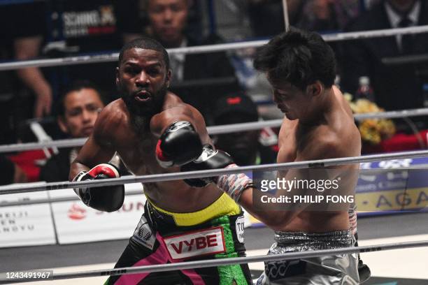 Boxer Floyd Mayweather fights against Japanese mixed martial artist Mikuru Asakura during their exhibition boxing match at the Saitama Super Arena in...