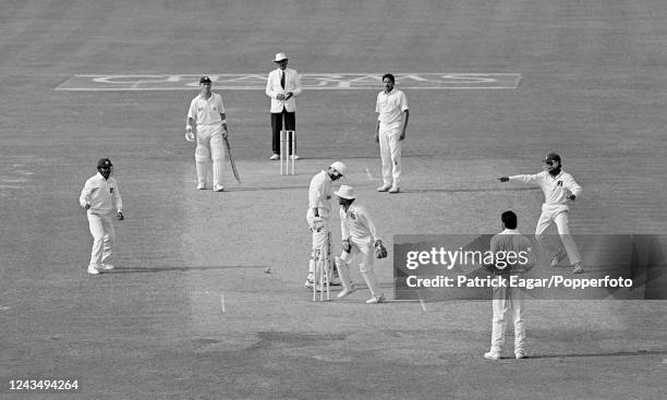 England captain Graham Gooch is stumped for 18 runs by India wicketkeeper Kiran More off the bowling of Anil Kumble as England follow on during the...